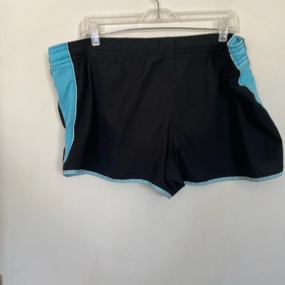 DRI – FIT NIKE blue and black running shorts ladies size XL